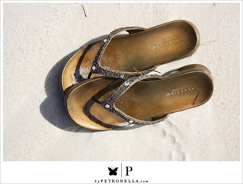 Beach sandals in the sand